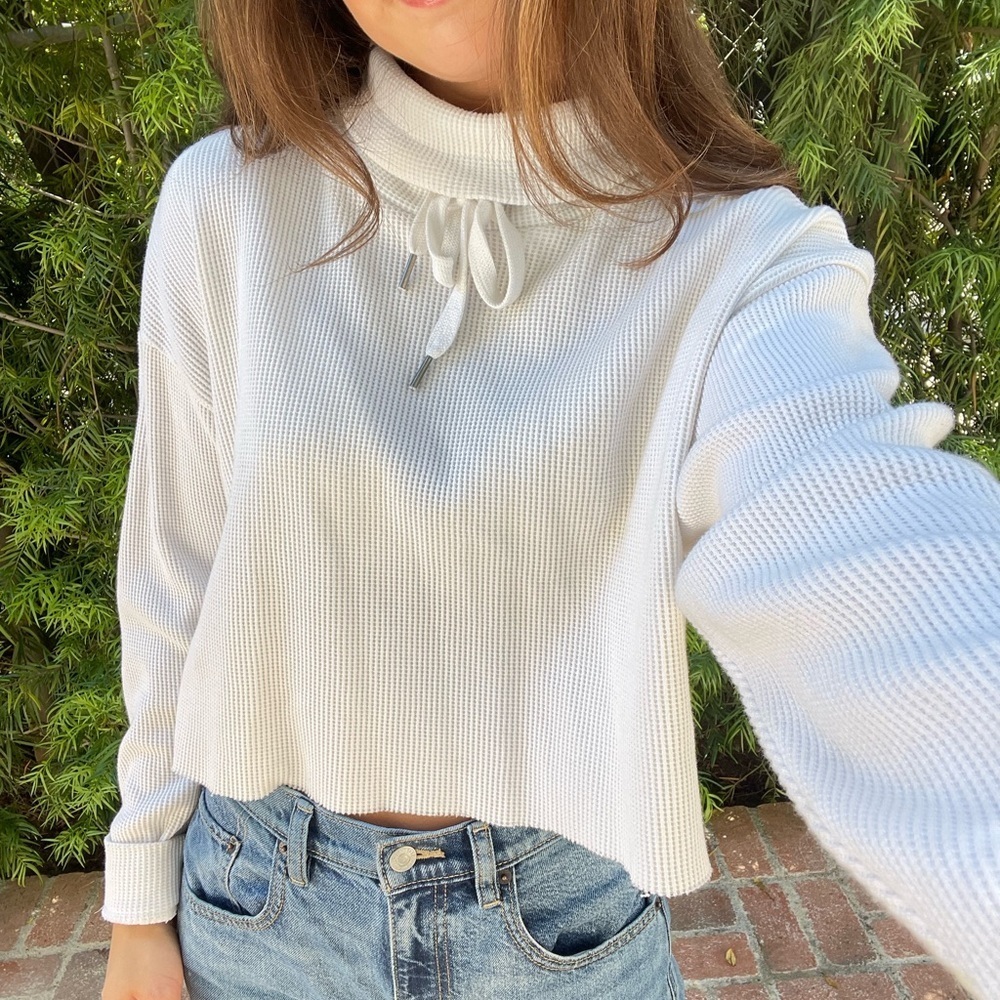 White thermal turtleneck sweater